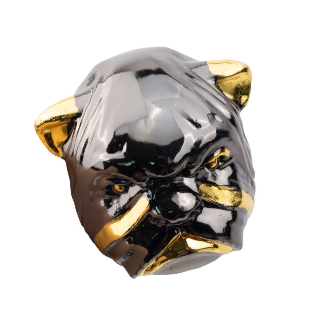 Black and gold bulldog head detail on walking cane