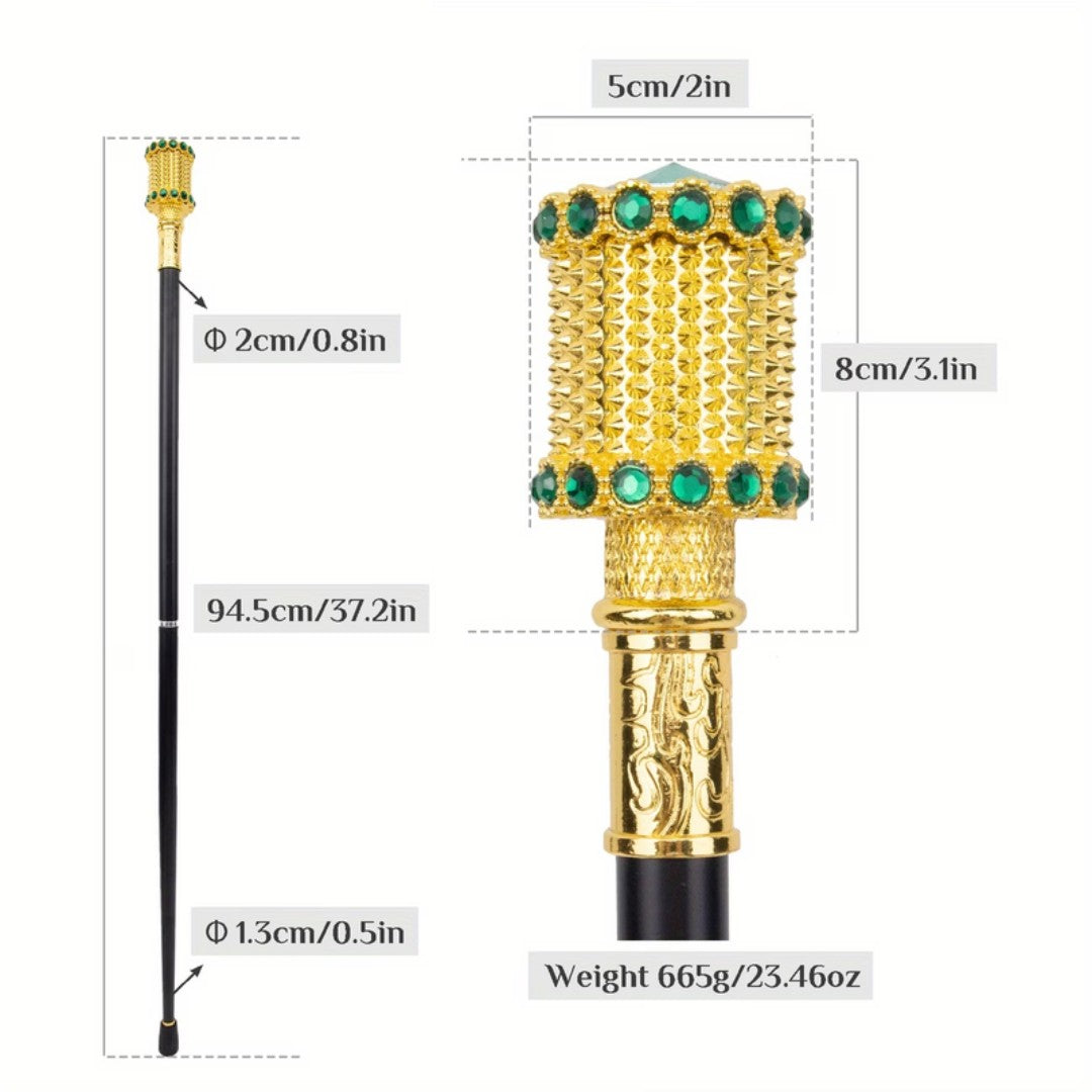 Green coloured stones ringing the gold studded head detail